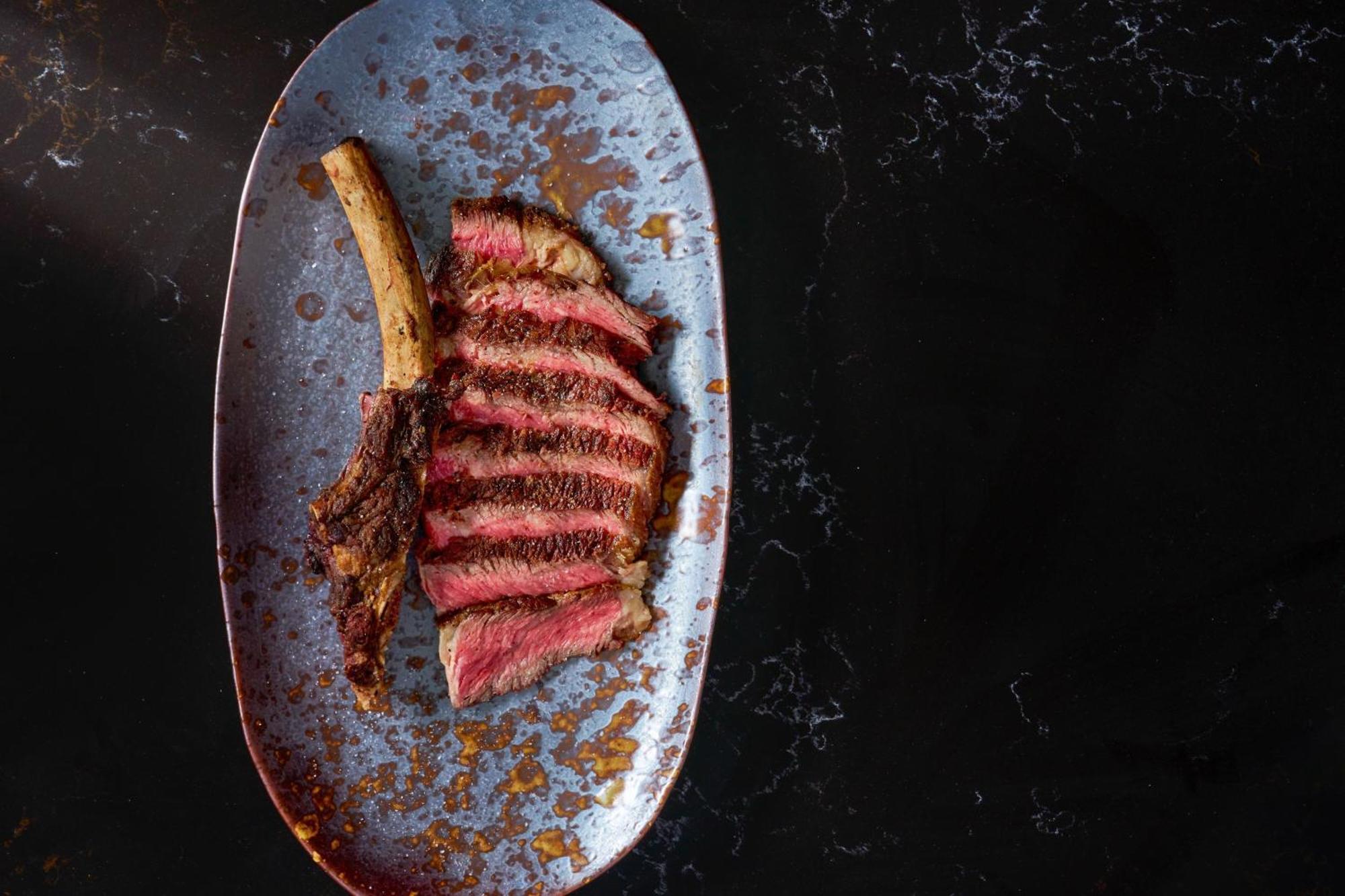 W Singapore - Sentosa Cove Buitenkant foto A grilled steak